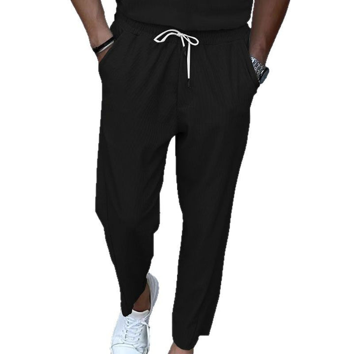 Herren nan atmungsaktive Leinenmix-Chinohose mit elastischem Tunnelzugbund, dezenter Bügelfalte und seitlichen Eingrifftaschen Drune