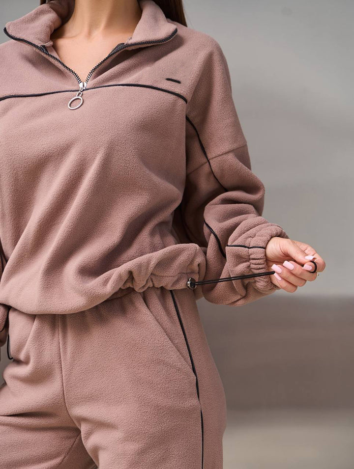 Damen Fleece-Sportanzug mit hohem Kragen und praktischen Reißverschlussdetails Drune