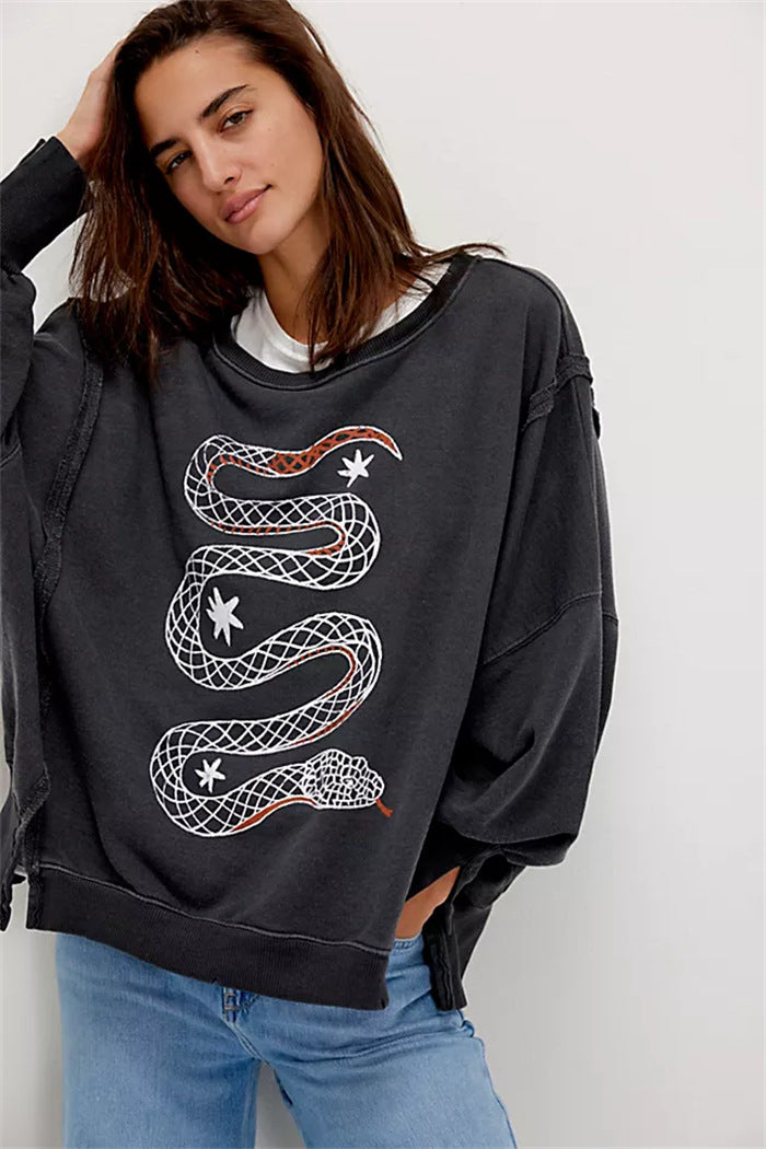 Damen oversized Sweatshirt mit Rüben-Print, ausgefransten Nahtakzenten und Daumenlochärmeln Drune