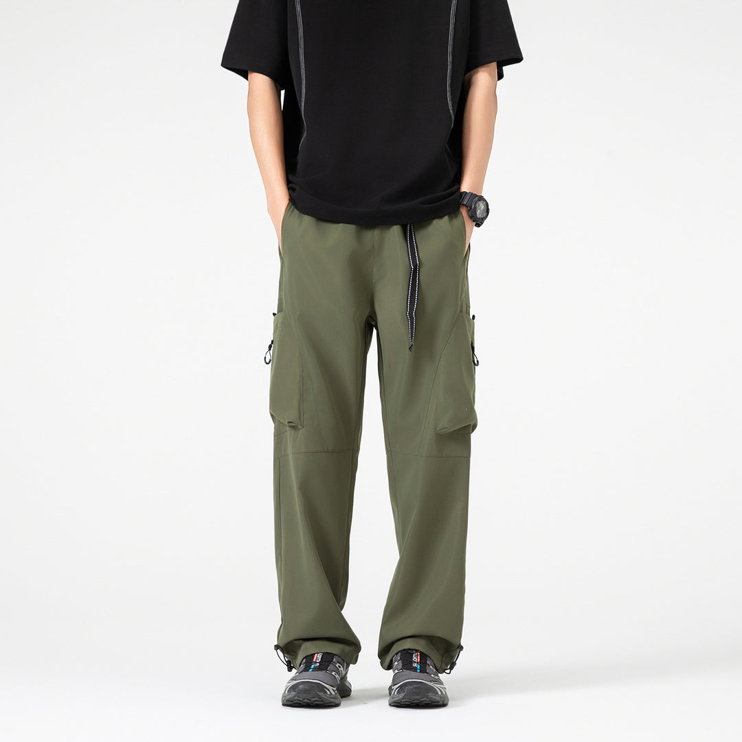 Herren Weite Cargo‑Hose im Baggy‑Stil mit Tunnelzugbund, großen Klapptaschen und verstellbaren Beinabschlüssen Drune