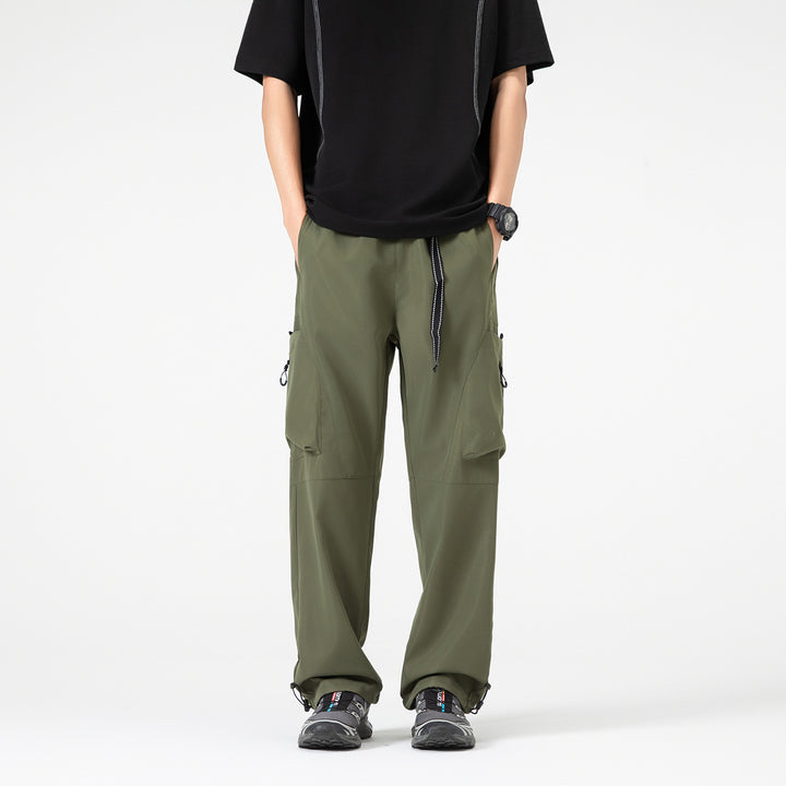 Herren Weite Cargo‑Hose im Baggy‑Stil mit Tunnelzugbund, großen Klapptaschen und verstellbaren Beinabschlüssen Drune