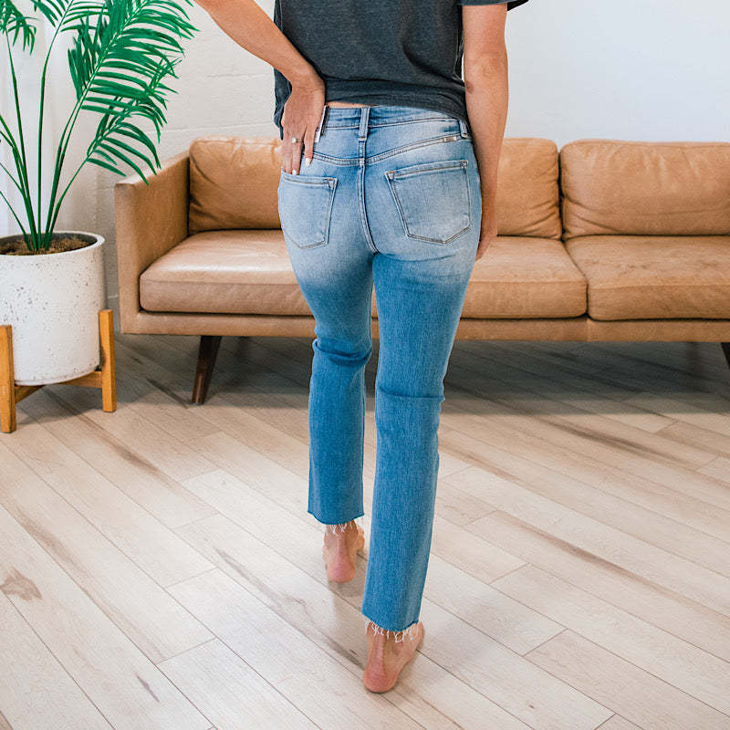 Damen High-Waist Jeans mit knöpfbarem Einsatz und fransigem Saum Drune
