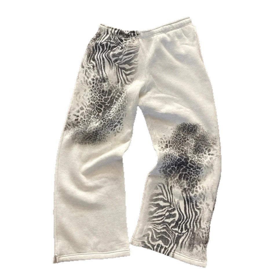 Damen nan lockere Sweathose mit asymmetrischem Animal-Print, elastischem Komfortbund und geradem Bein Drune
