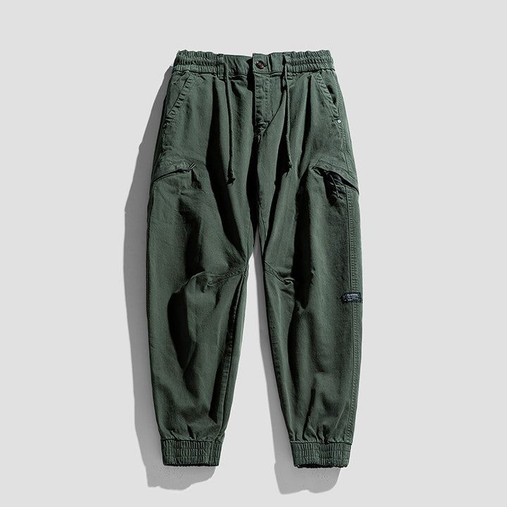 Herren Cargo-Jogginghose im Utility-Look mit elastischem Bund, Kniepaneelen und Klappentaschen Drune