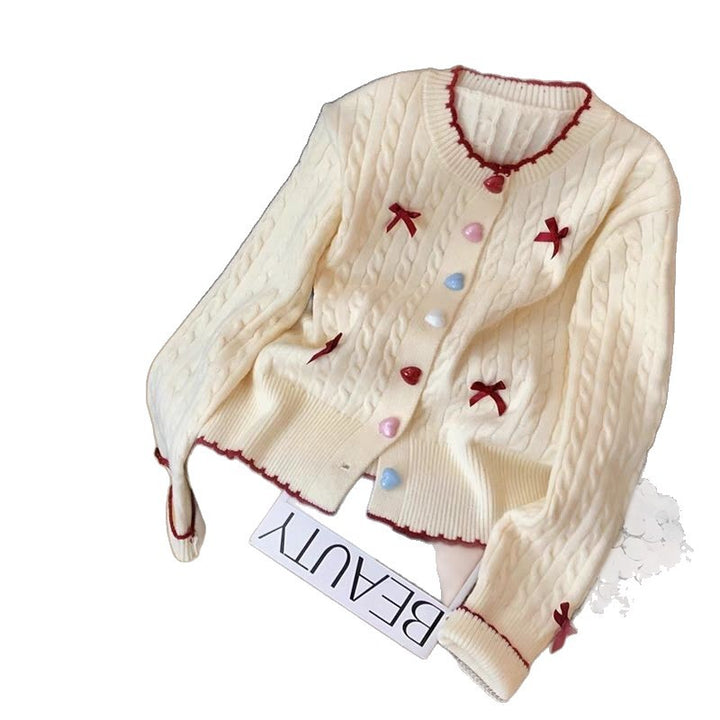 Damen Strickjacke mit Zopfmuster und verspielten Verzierungen Drune