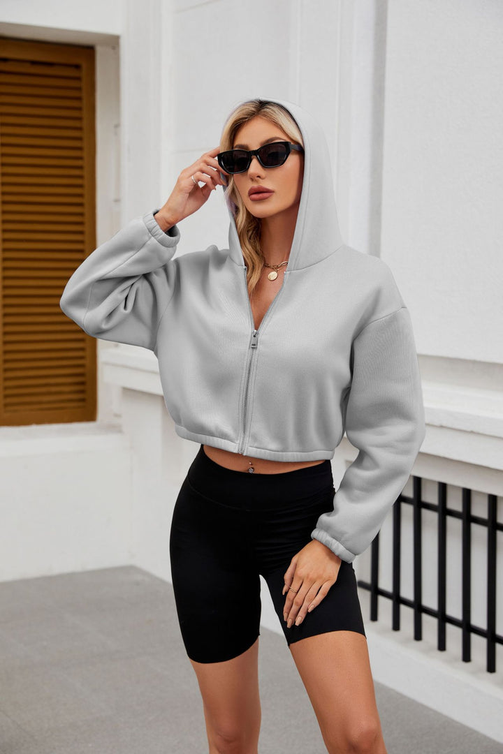 Damen Cropped Kapuzenjacke mit durchgehendem Reißverschluss und oversized Ärmeln Drune