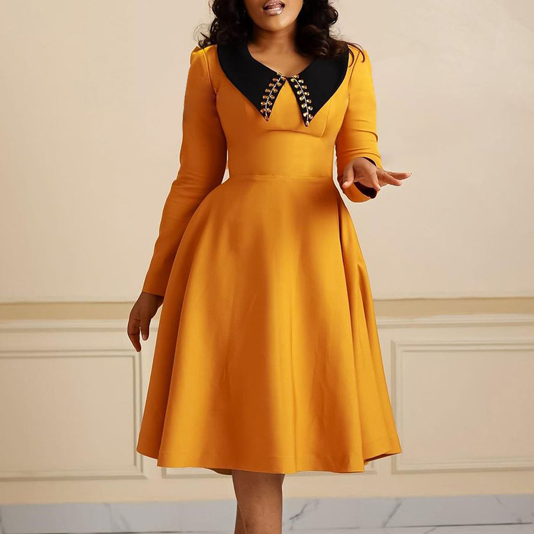 Damen Kleid mit elegantem Kragen und voluminösem Rock Drune