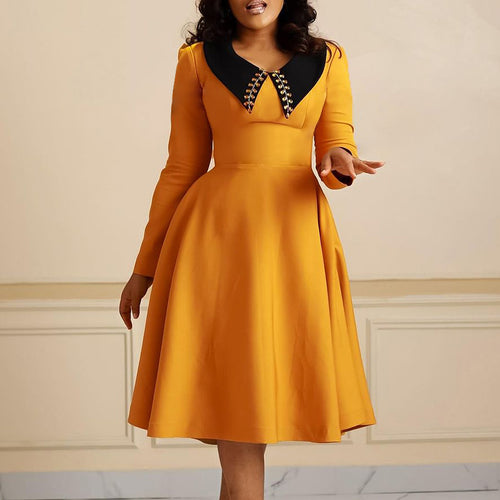 Damen Kleid mit elegantem Kragen und voluminösem Rock Drune