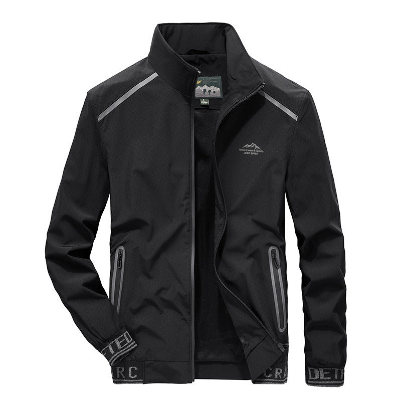 Herren Softshelljacke mit reflektierenden Einsätzen, wasserabweisenden Reißverschlusstaschen und hohem Stehkragen Drune