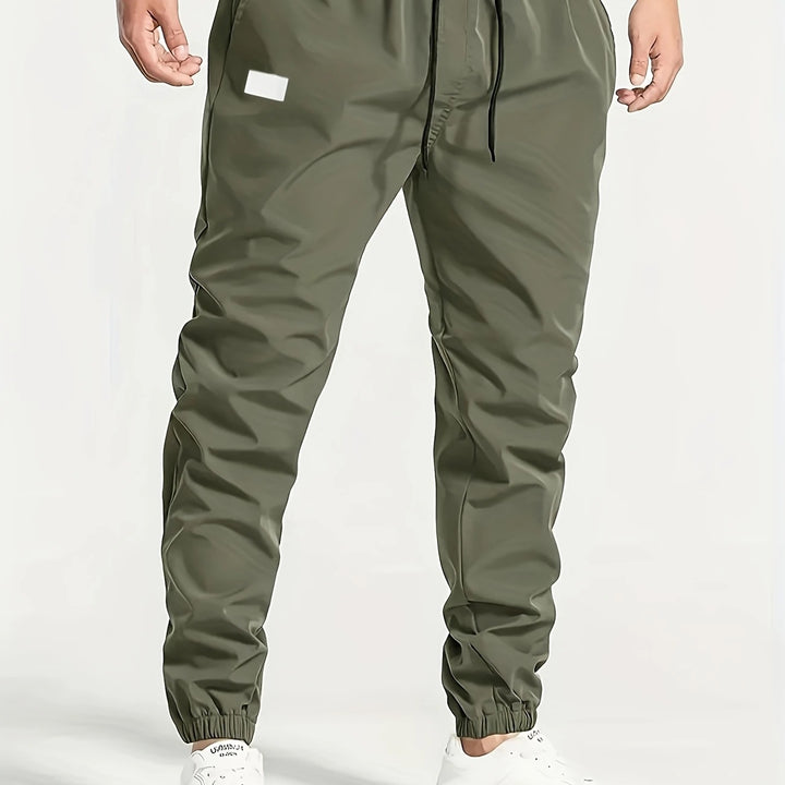 Herren Slim‑Tapered Tech‑Joggerhose mit Tunnelzugbund, elastischen Knöchelbündchen und funktionalen Seitentaschen Drune
