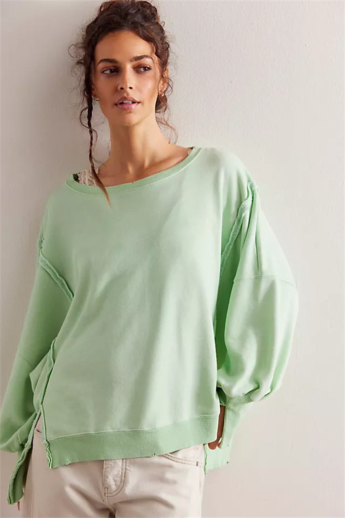 Damen oversized Sweatshirt mit Ballonärmeln, offenen Saumnähten und seitlichen Schlitzen Drune