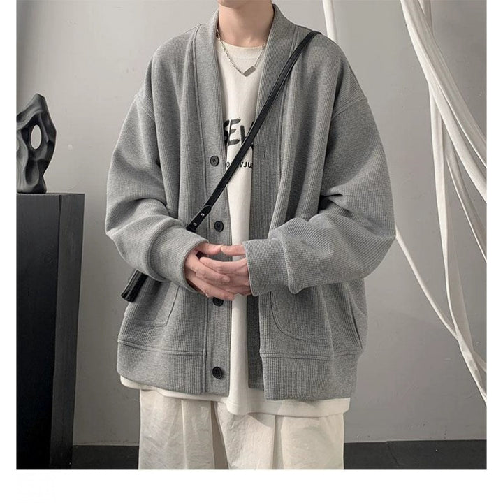 Damen lässige Strickjacke mit tiefem V-Ausschnitt und praktischen Taschen Drune
