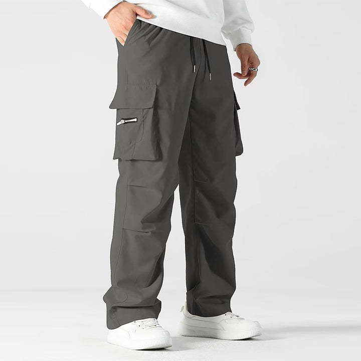 Herren weite Utility-Cargohose mit Tunnelzugbund, Knieabnähern und Multifachtaschen Drune