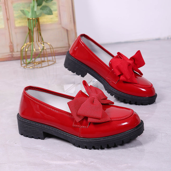 Damen Plateau-Loafer aus Lackimitat mit profilierter Gummisohle und Zierschleife Drune