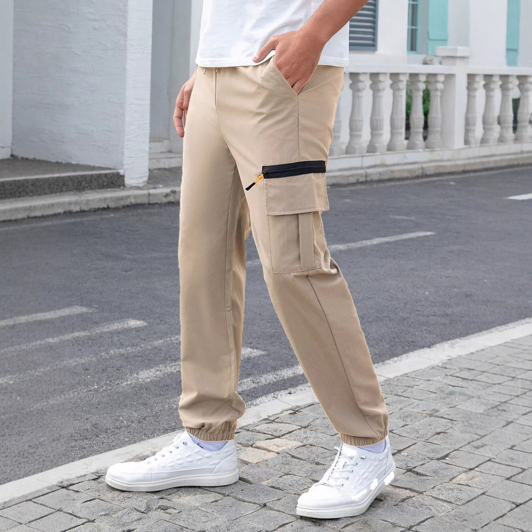 Herren Tech-Cargo-Jogginghose mit elastischem Tunnelzug, Reißverschluss‑Beintasche & eng anliegendem Fußbündchen Drune