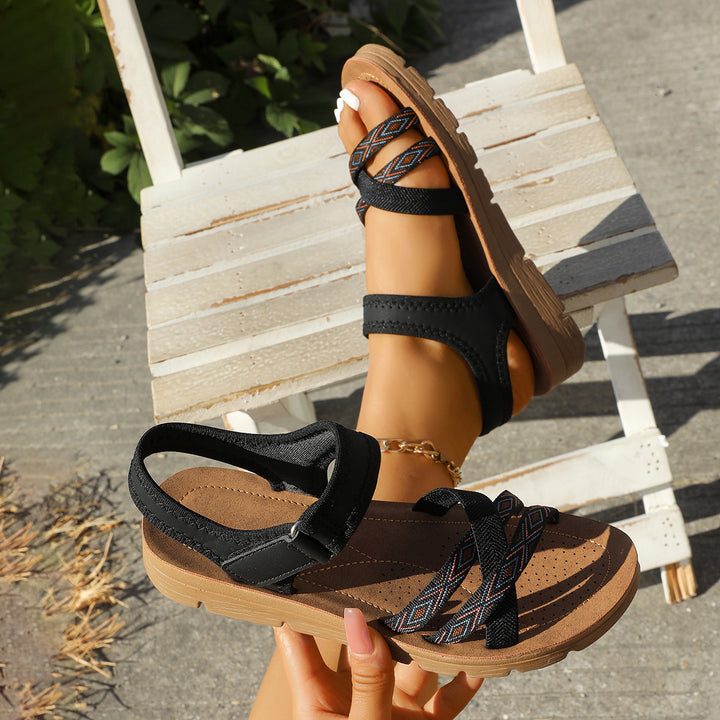 Damen Sandalen mit elastischen Kreuzriemen und Leoprint-Zehenriemen Drune