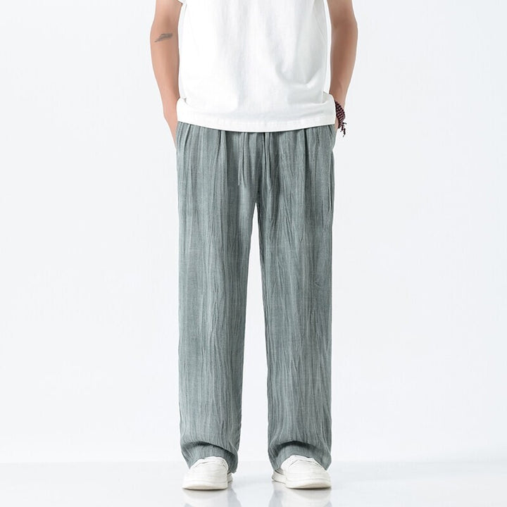 Herren nan weite Leinenhose mit verstellbarem Tunnelzugbund, lässiger Bundfaltenoptik und seitlichen Eingrifftaschen Drune