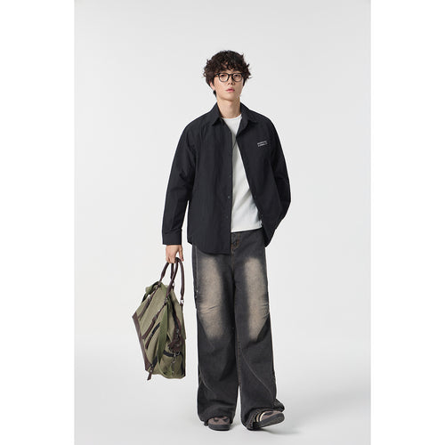 Unisex Lockeres Coach-Shirtjacke mit Kentkragen, Druckknopfleiste und minimalem Brustprint Drune