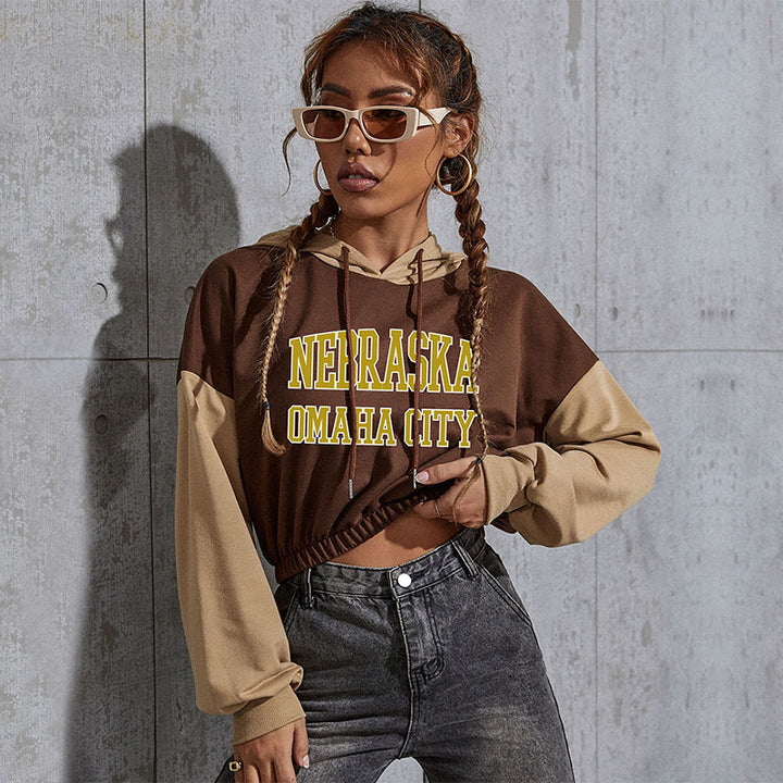 Damen Cropped Hoodie mit Kontrastärmeln, elastischem Saum und schmelzendem Smiley-Print Drune