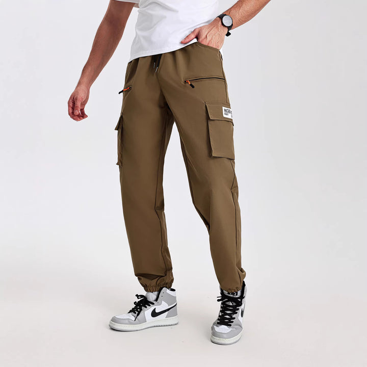 Herren Utility-Cargohose im Joggerstil mit elastischem Bund, Multifachtaschen & Reißverschlusstaschen Drune