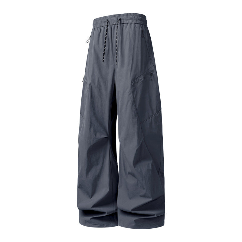 Herren Oversize-Utility-Cargo-Hose aus leichtem Nylon mit elastischem Kordbund, seitlichen Reißverschlusstaschen & weiter Ballon-Silhouette Drune