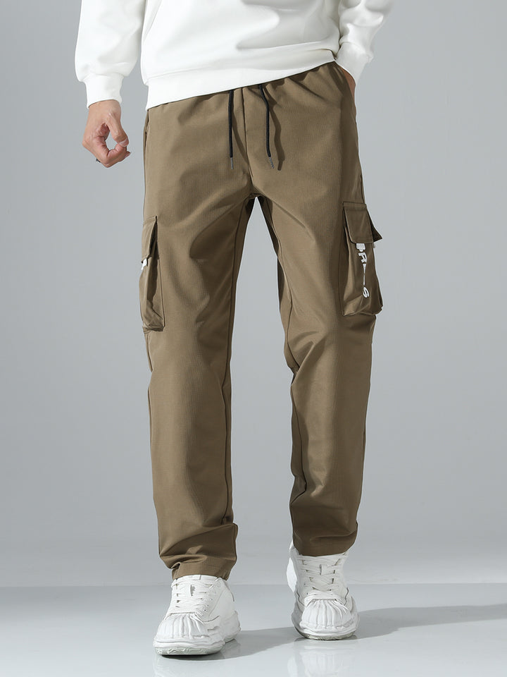 Herren Tapered Cargo-Jogginghose mit elastischem Tunnelzug, multifunktionalen Klapptaschen & ergonomischen Nähten Drune