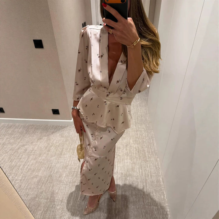 Damen Satin-Zweiteiler mit tailliertem Peplum-Top, tiefem V-Ausschnitt und knöpfbarem Midirock Drune