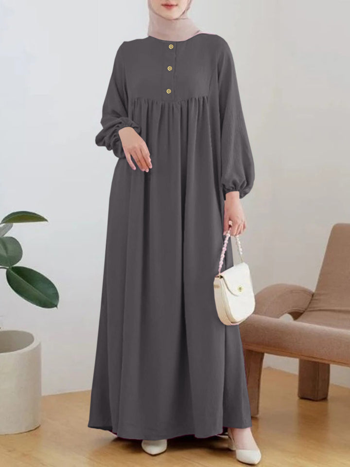 Damen luftiges Maxikleid mit bequemer Knopfleiste und eleganten Puffärmeln Drune