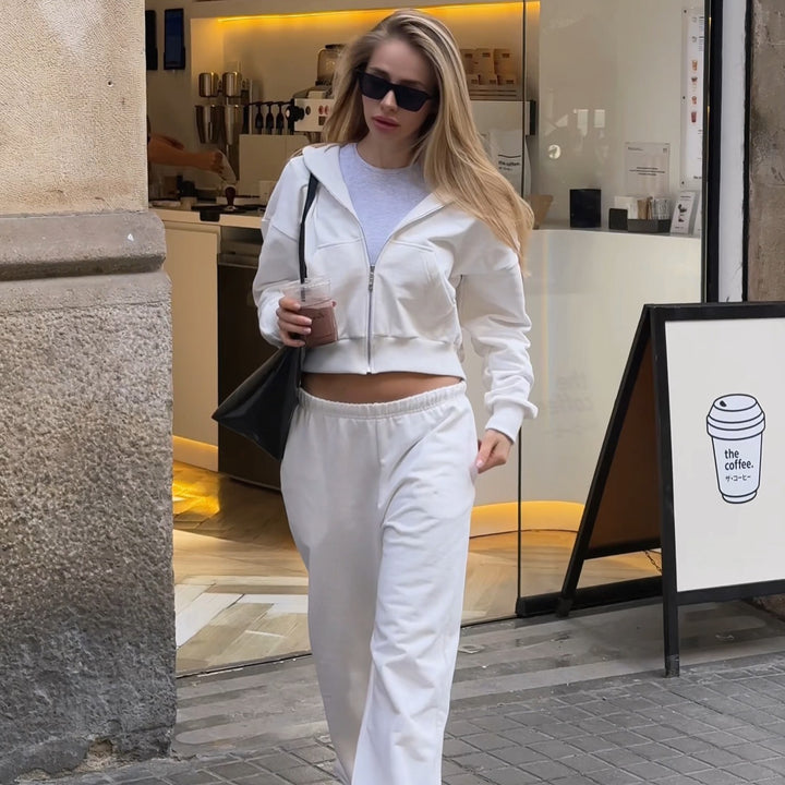 Damen Cropped Kapuzen-Sweatjacke mit Kängurutasche und tailliertem Rippbund Drune