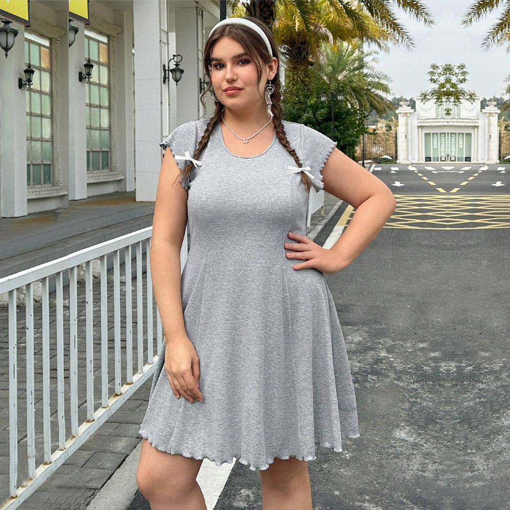 Damen lässiges Jersey-Kleid mit verspielt geschwungenem Saum und dekorativen Bändern Drune