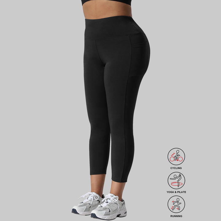 Damen Capri-Trainingstights mit hohem Bund, Slim-Fit und seitlichen Taschen Drune