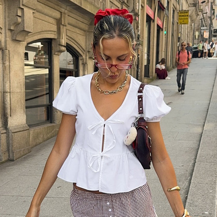Damen Wickeloberteil mit Puffärmeln und femininem Peplum-Saum Drune