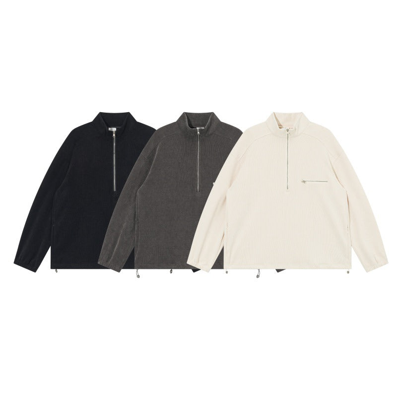 Unisex Oversize Halbzip-Pullover aus Cord‑Mix mit Brust-Reißverschlusstasche und Kordelzugsaum Drune