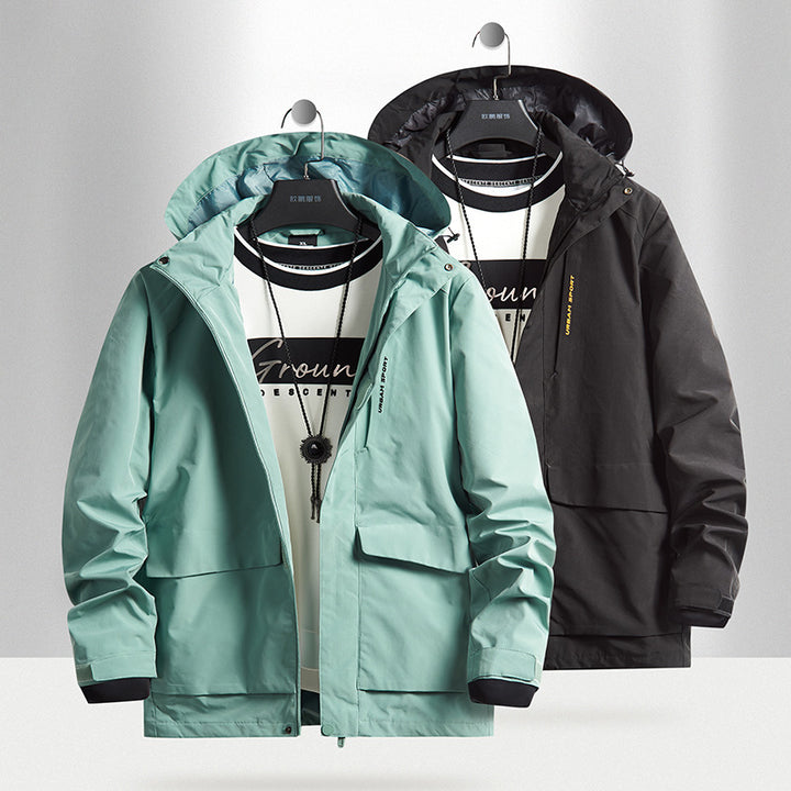 Herren wasserdichte Stadt-Outdoorjacke mit Kapuze, verdecktem Reißverschluss und Cargo-Taschen Drune