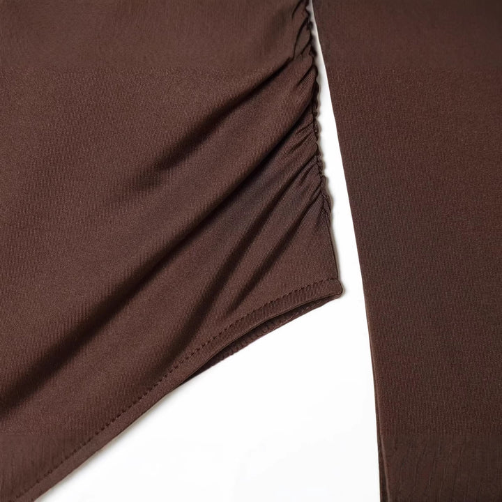Damen Body mit tiefem V‑Ausschnitt, Raffung und Metallschließe Drune