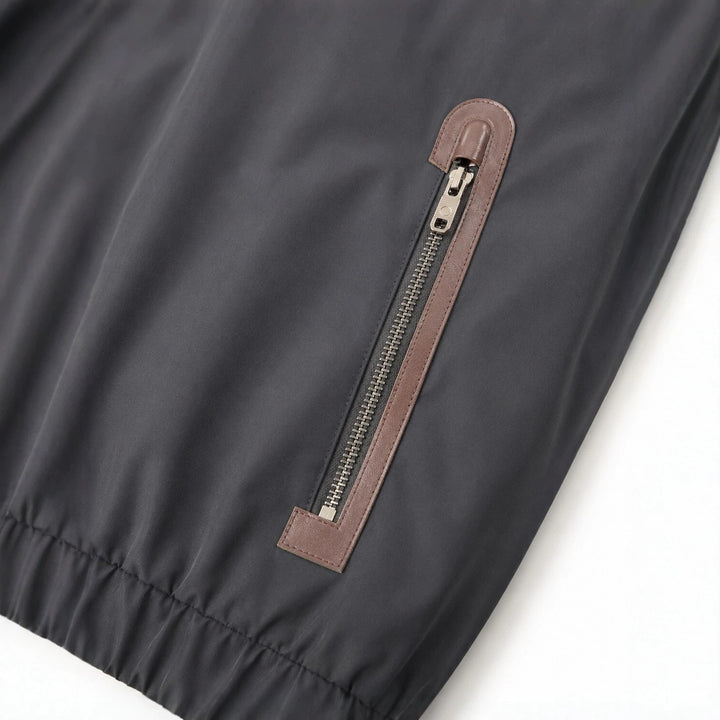 Herren Leichte Softshell‑Hoodiejacke mit wasserabweisender Außenlage, Lederapplikationen und Reißverschlusstaschen Drune