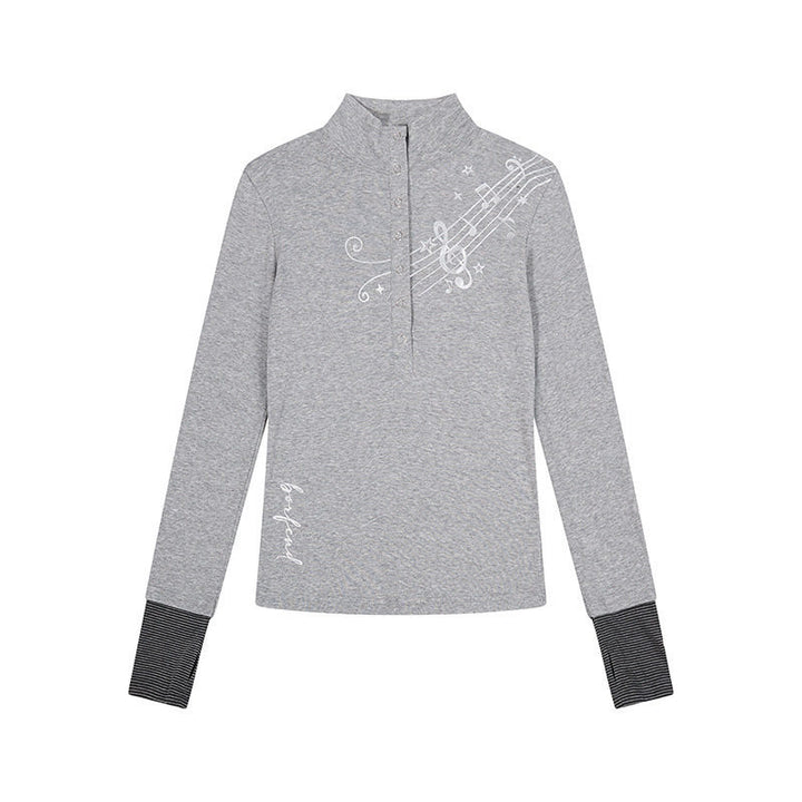 Damen Langarm-Poloshirt mit Stehkragen, Knopfleiste und Noten-Print Drune