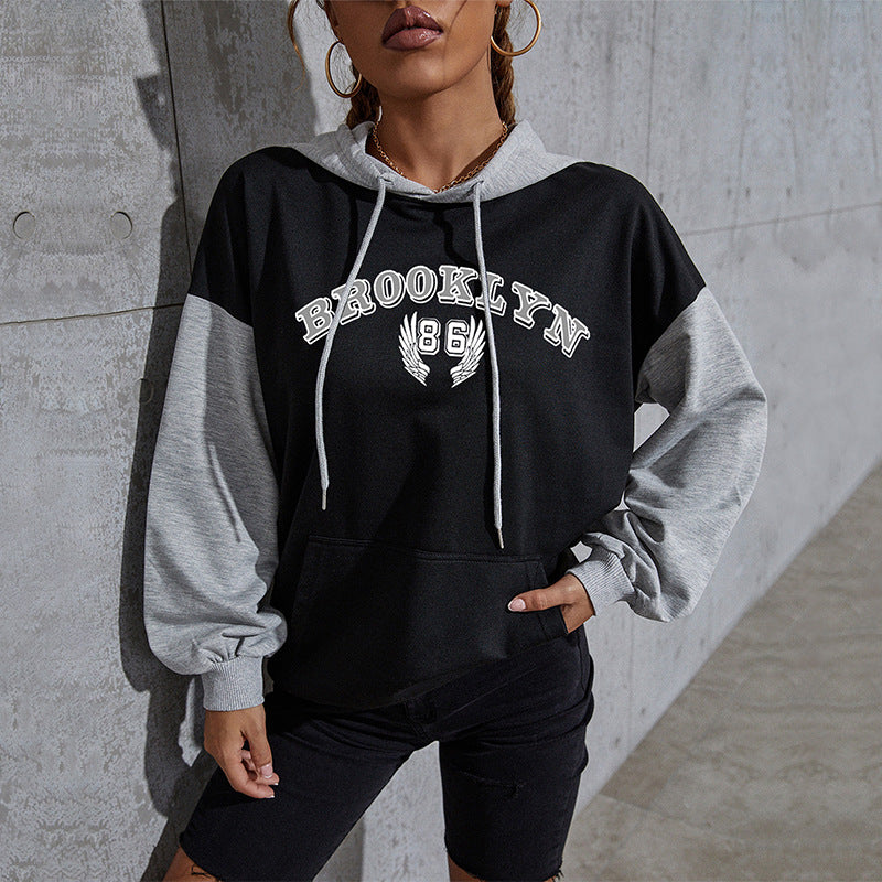 Damen Oversize-Kapuzenhoodie im Collegestyle mit Colorblock-Ärmeln, Kängurutasche und Kordelzug Drune