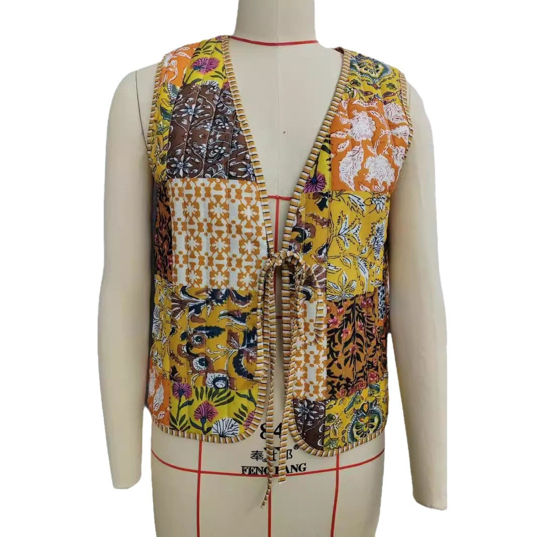 Damen Patchwork‑Weste mit Bindeband, gestreifter Innenverarbeitung und Kontrastpaspel Drune