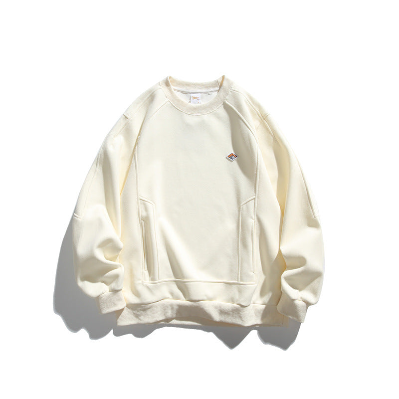 Unisex Oversize-Sweatshirt aus French-Terry mit Raglanärmeln, verdeckten Eingrifftaschen und kleinem Logopatch Drune