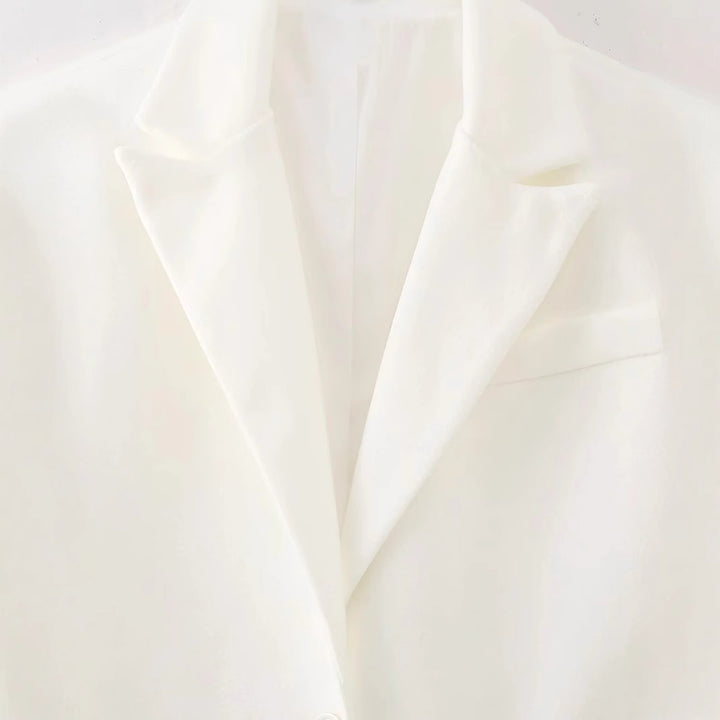 Damen nan langer Fransen‑Mantelblazer mit Plissee‑Saum, Reverskragen und Pattentaschen Drune