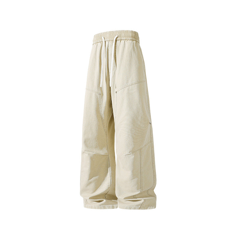 Herren weite Baggy-Cargohose aus gewaschenem Canvas mit Elastikbund und dekorativen Nahtpaneelen Drune