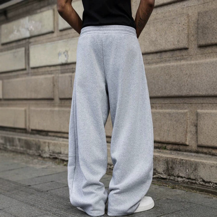 Herren weite Sweatpants im Baggy Cut mit elastischem Bund, Tunnelzug und Eingrifftaschen Drune
