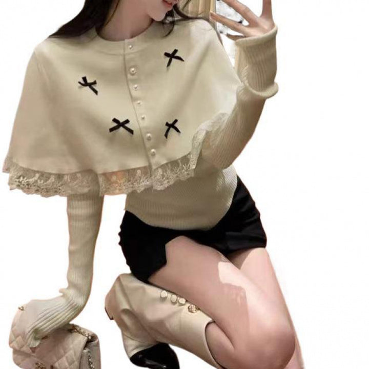 Damen Elegante Strickbluse mit Spitzenbesatz und dekorativen Knöpfen Drune