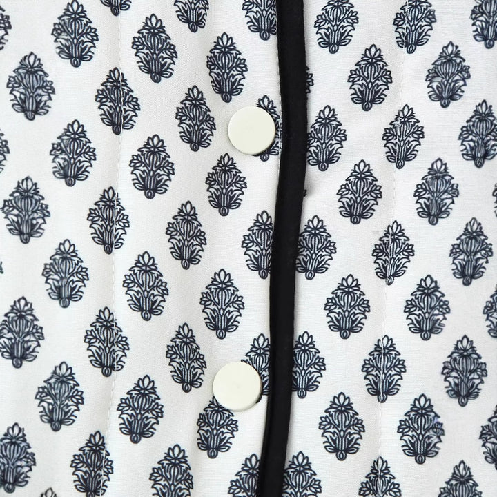 Damen nan gesteppte Kurzjacke mit Rundhalsausschnitt, Druckknöpfen und Kontrastpaspel Drune