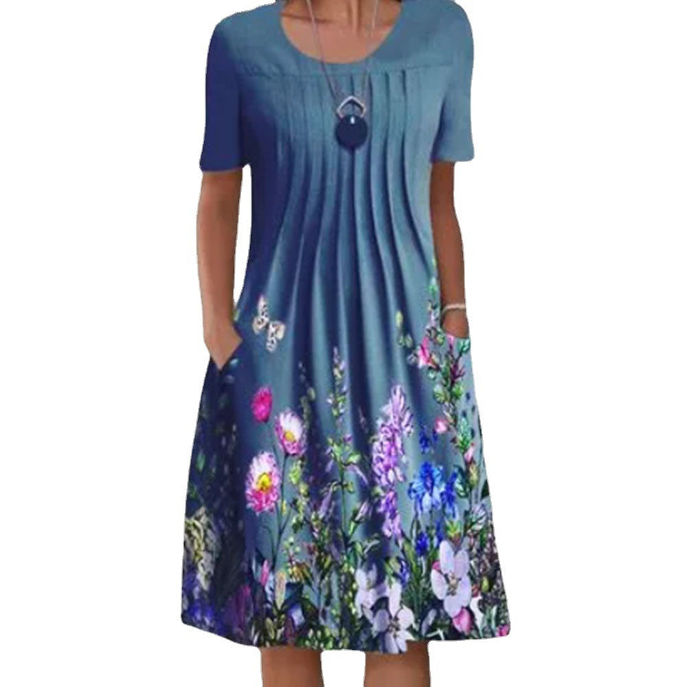 Damen Plissee Midi Kleid mit kurzen Ärmeln, seitlichen Taschen und floralem Saum Drune
