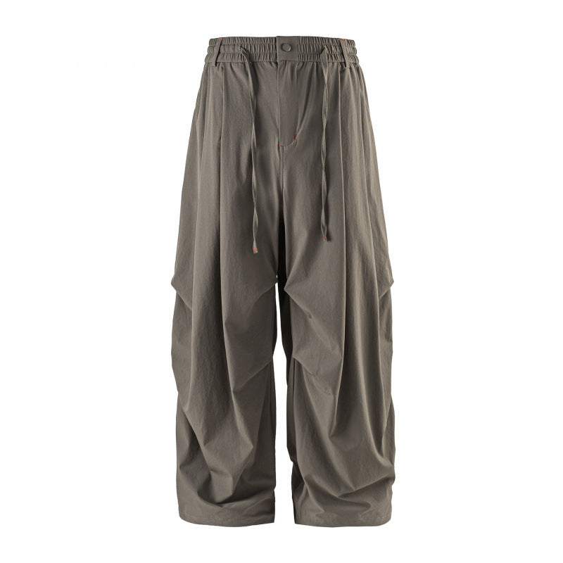 Unisex Weitgeschnittene technische Cargo-Hose mit Gummibund, Kordelzug und Reißverschlusstaschen Drune