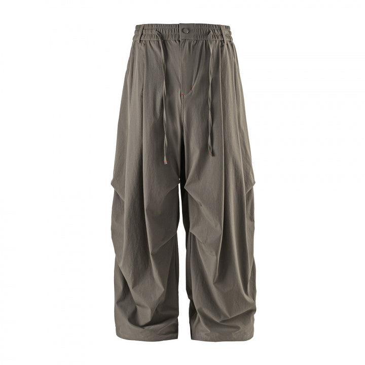 Unisex Weitgeschnittene technische Cargo-Hose mit Gummibund, Kordelzug und Reißverschlusstaschen Drune
