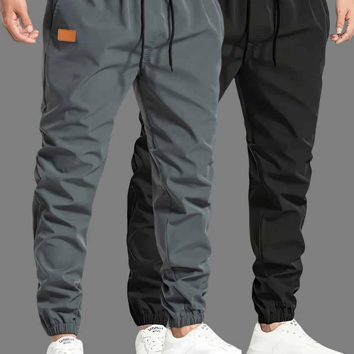Herren Slim‑Tapered Tech‑Joggerhose mit Tunnelzugbund, elastischen Knöchelbündchen und funktionalen Seitentaschen Drune
