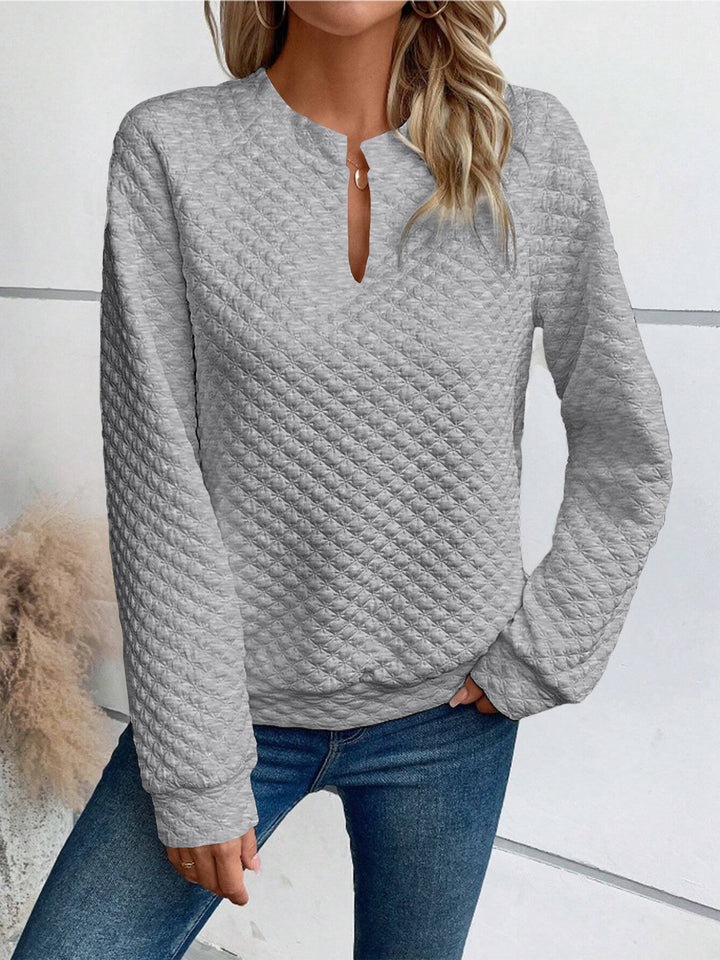 Damen Gestepptes Sweatshirt mit Schlitzkragen, Rautenstruktur und Raglanärmeln Drune